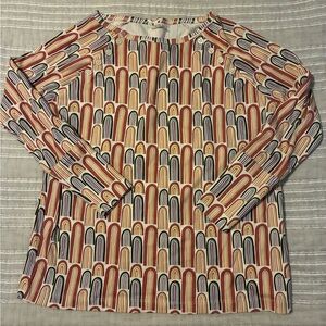 Kate Quinn rainbow top